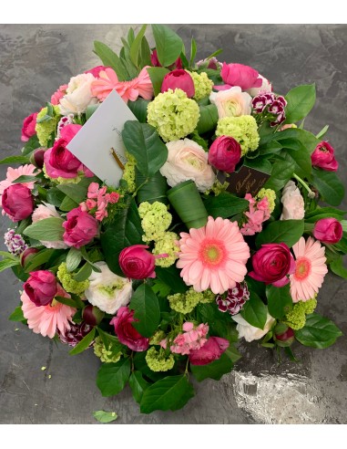 Pastel funeral round arrangement
