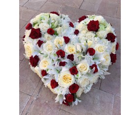 Red and white funeral heart