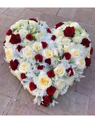 Red and white funeral heart